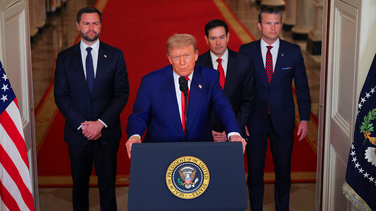 U.S. President Donald Trump, surrounded by his top team members, delivers an address to the nation from the White House on June 21, 2025. (Photo: AP)
