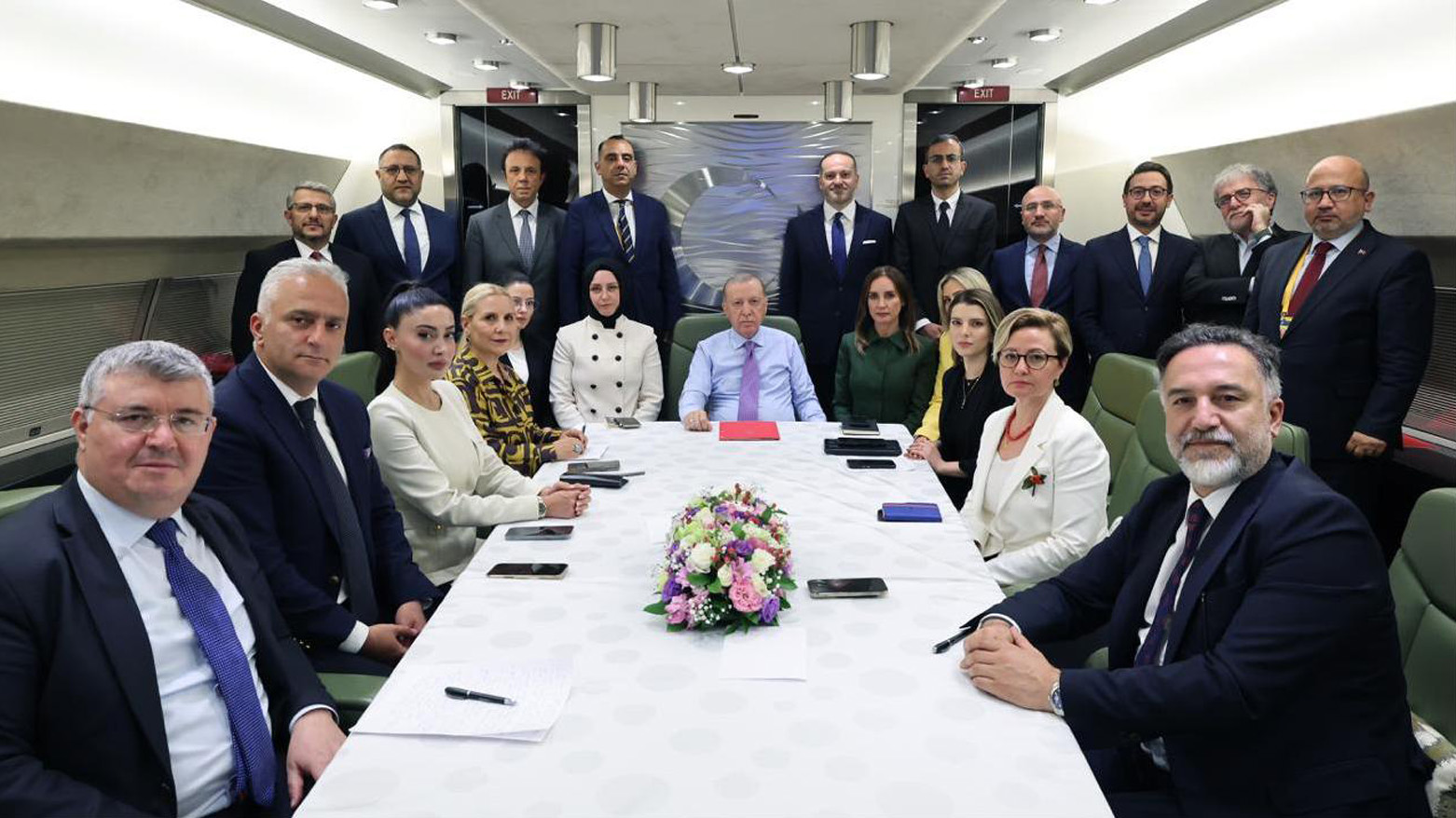 Turkish President Recep Tayyip Erdogan, following a meeting with his team aboard his plane on the way back to Turkey, June26, 2025.
