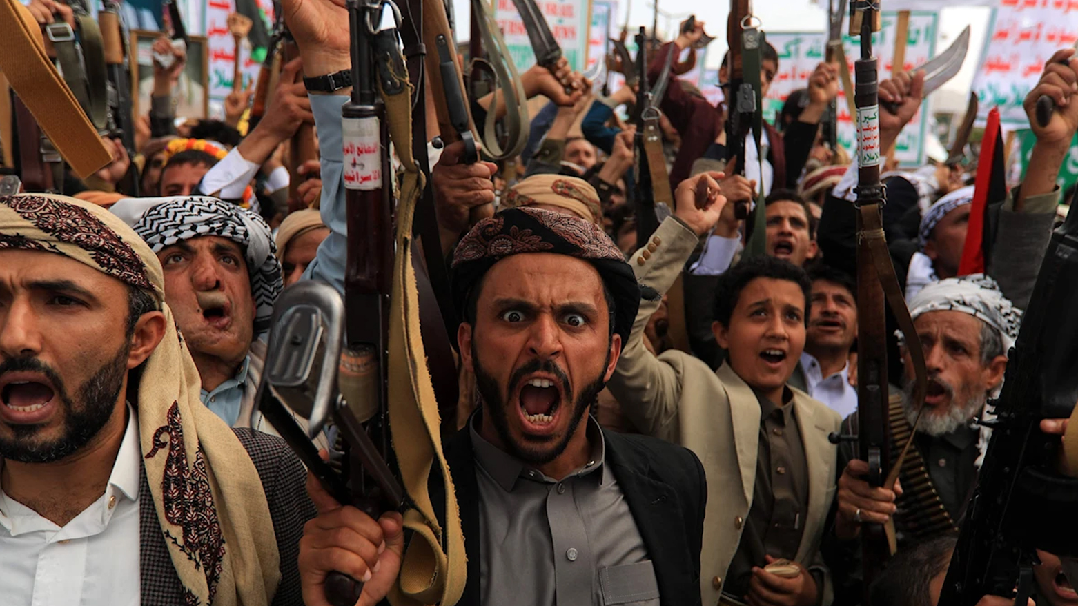 Yemenis brandishing rifles chant slogans during a rally in solidarity with Palestinians in the Gaza Strip, in the Huthi-controlled capital Sanaa on May. 9, 2025.