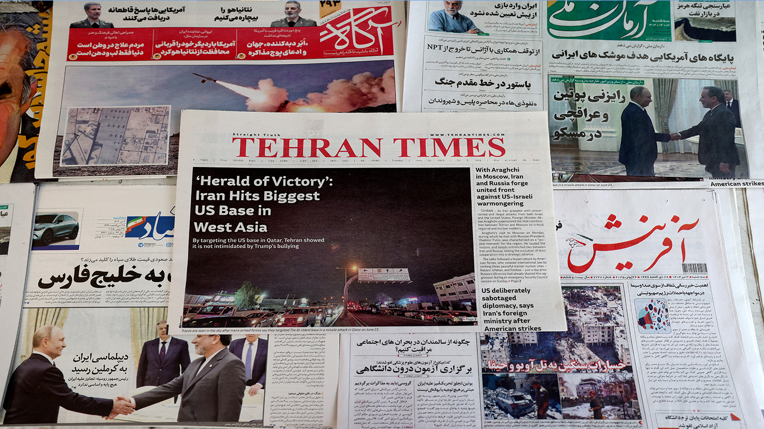 Iranian newspaper headlines pictured on display at a stall in Tehran on Jun. 24, 2025. (Photo: AFP)