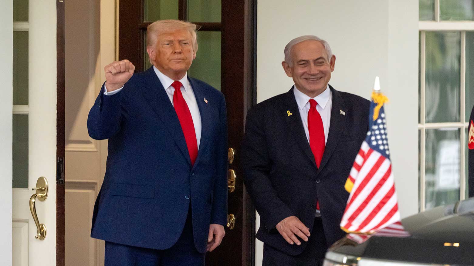 President Donald Trump, left, stands with Israel's Prime Minister Benjamin Netanyahu at the White House, April 7, 2025. (Photo: AP)