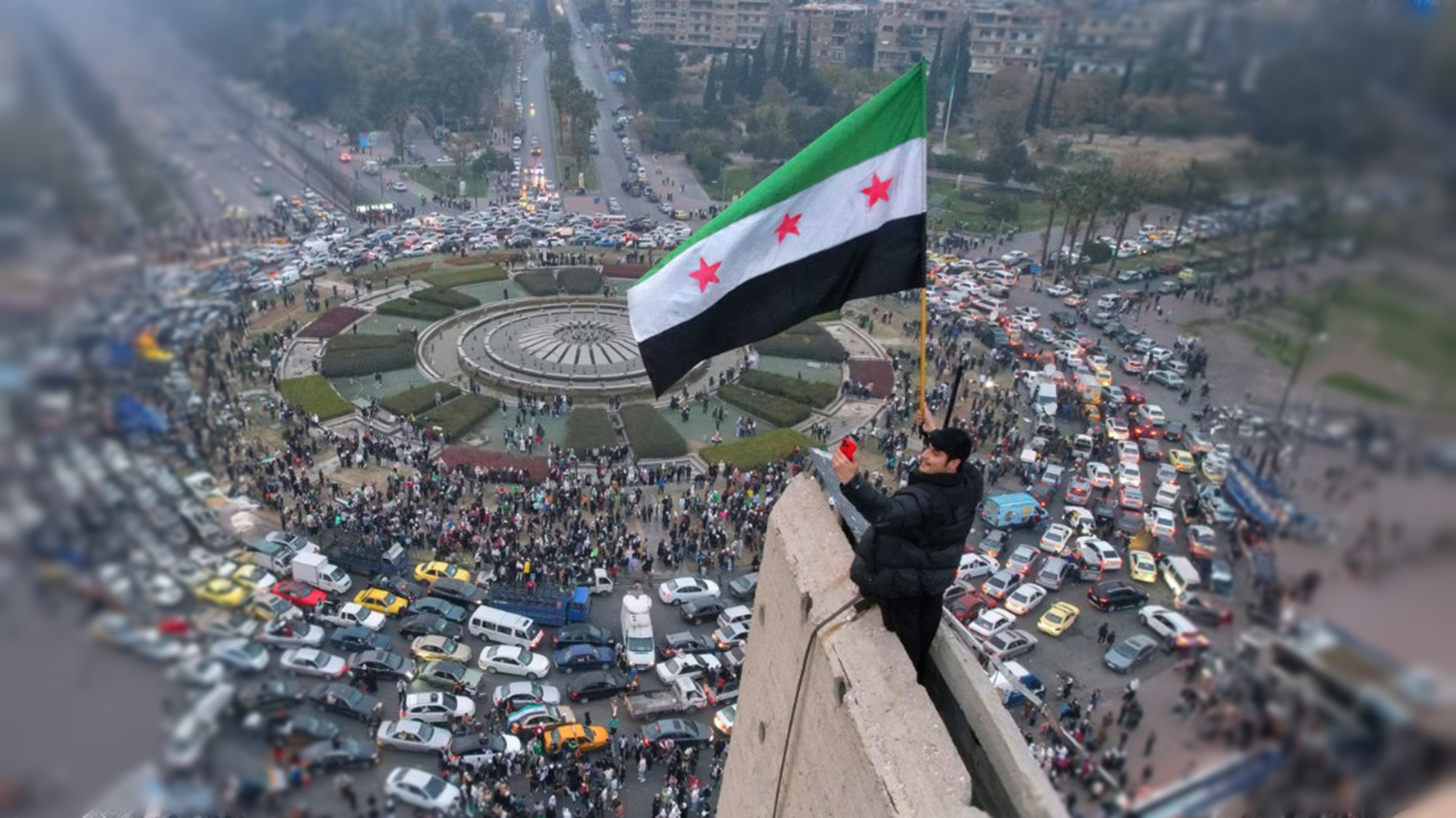 Syrian people celebrate their freedom, following the fall of Assad's regime, in December 2024. (Photo: Social Media)