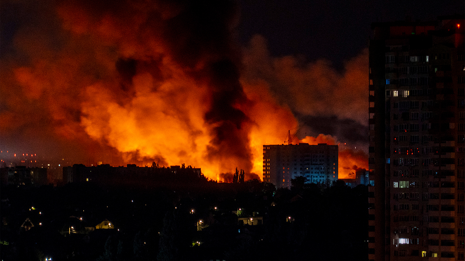 Flames and smoke billow from buildings during mass Russian drones and missile strikes on the Ukraine's capital on July 4, 2025. (Photo: AFP)