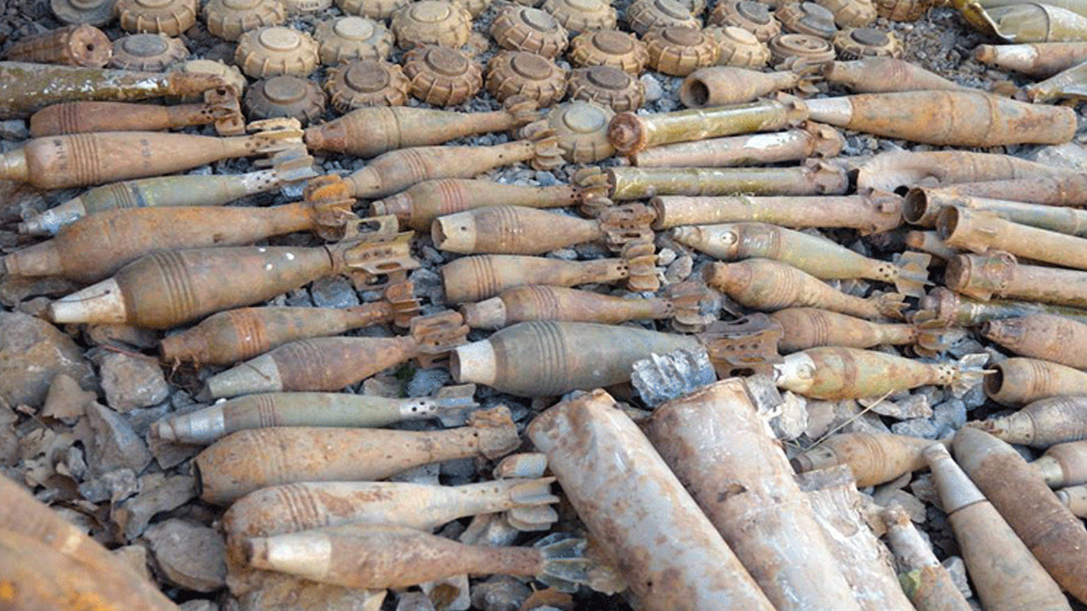A large collection of rusted and deactivated explosive ordnance in Choman district. (Photo: Submitted to Kurdistan24)