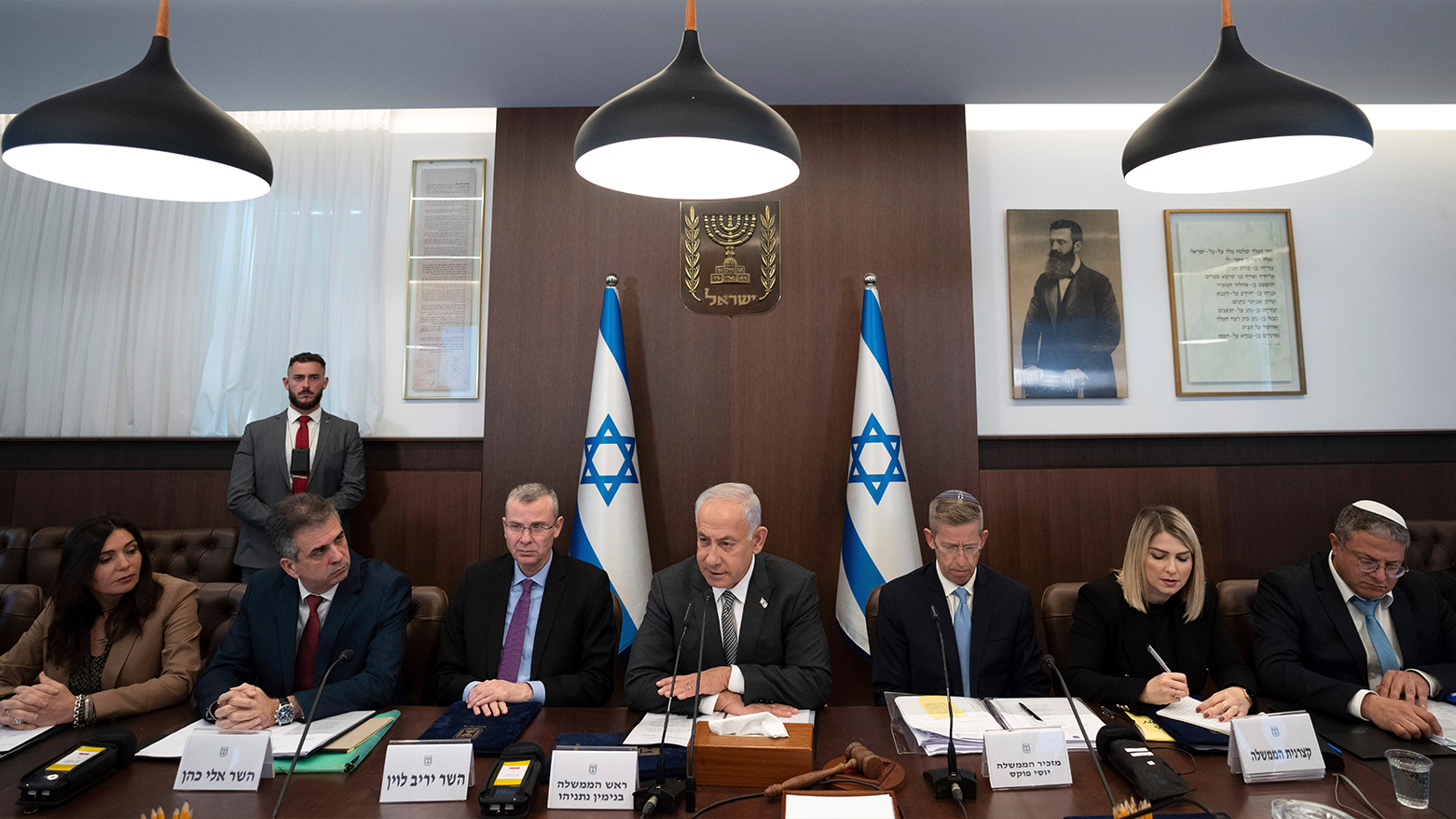 Israeli Prime Minister Benjamin Netanyahu, center, chairs the weekly cabinet meeting in Jerusalem, Sunday, Feb.12, 2023. (Photo|: AP)