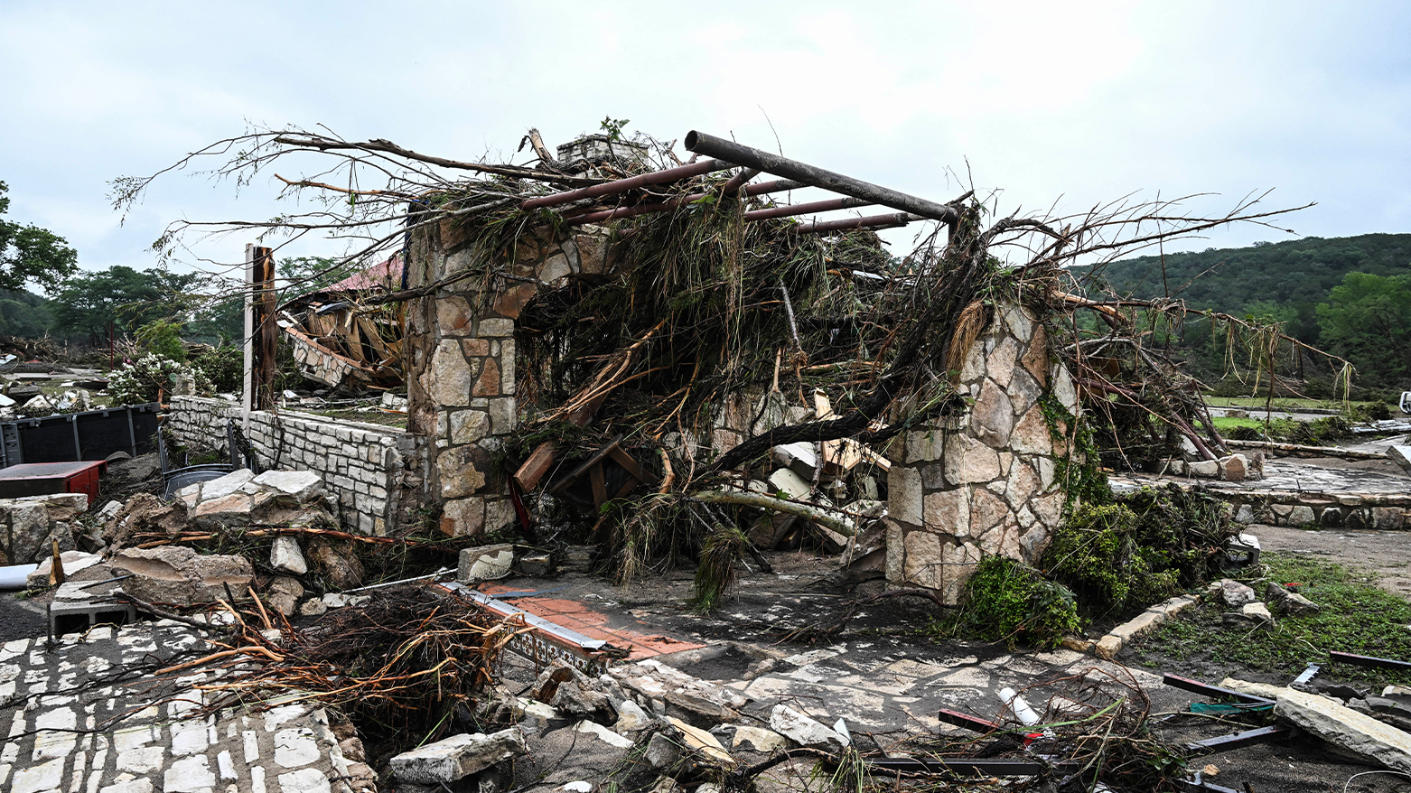 A damaged home is seen near Camp Mystic, the site of where at least 20 girls went missing after flash flooding in Hunt, Texas, on July 5, 2025. (Photo: AFP)