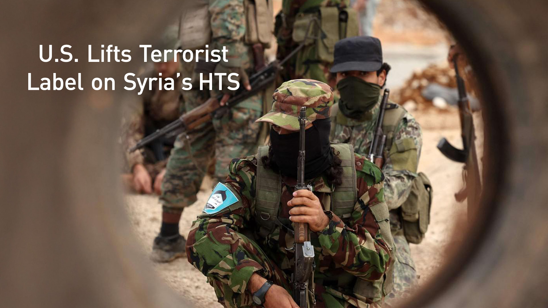 The image shows fighters with Syria's "Hayat Tahrir al-Sham" (HTS). (Photo: AFP)