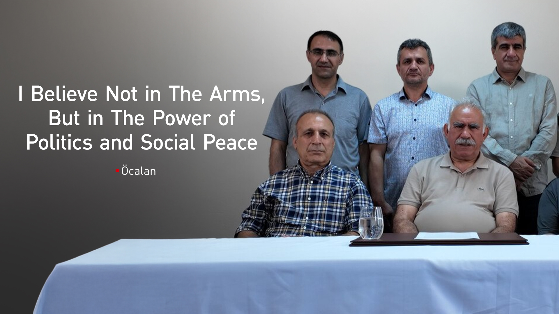 The image shows Abdullah Öcalan delivering a video message calling for the dissolution of the PKK. (Graphics: Kurdistan24)