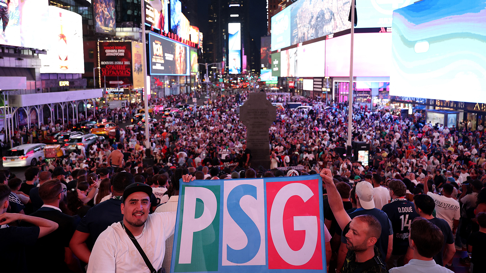Paris Saint-Germain fans gather at Times Square in New York on July 11, 2025, ahead of the FIFA Club World Cup 2025 final football match between England's Chelsea and France's Paris Saint-Germain on Jul. 13, 2025. (Photo: AFP)