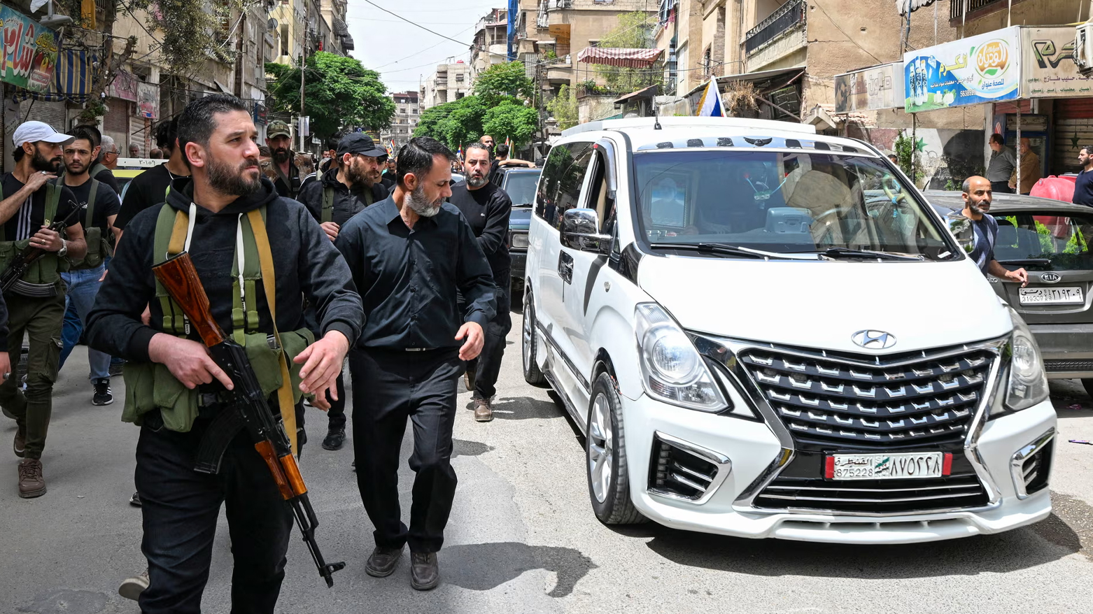 Armed members of Syria's Druze community attend the funeral of seven people killed during overnight clashes with Syrian security forces, in Damascus, on April 30, 2025. (Photo: AFP)