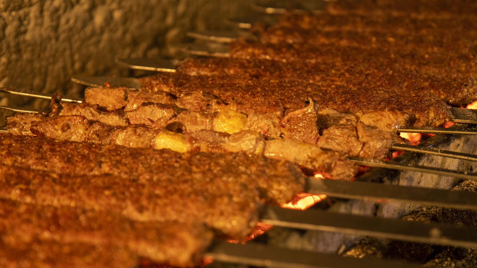 Skewers of Kebab being prepared at the Yasin's Kebab House. (Photo: Kurdistan24)