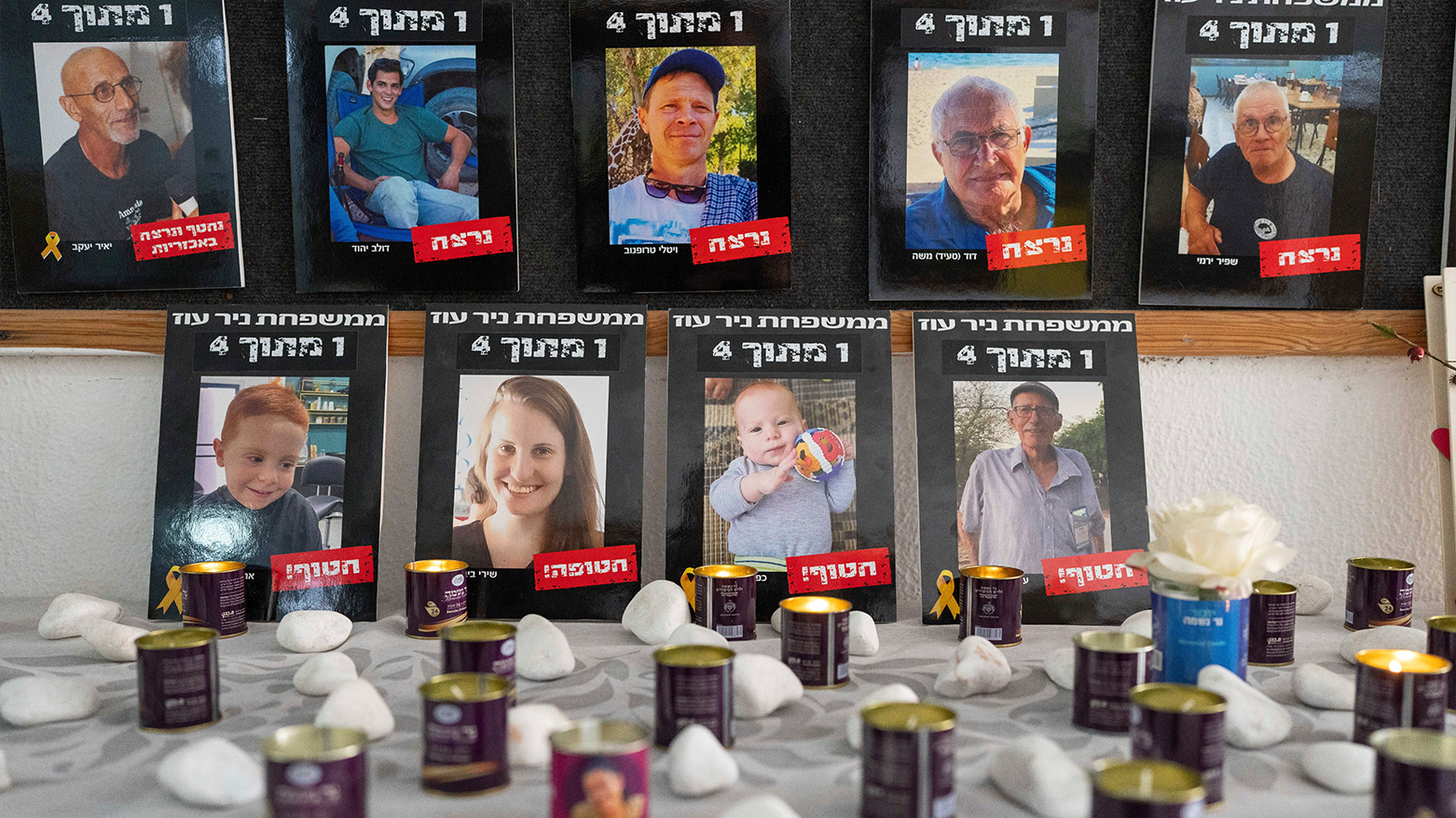 Photos of slain hostages are displayed at Kibbutz Nir Oz in southern Israel, Feb. 25, 2025. (Photo: AP)