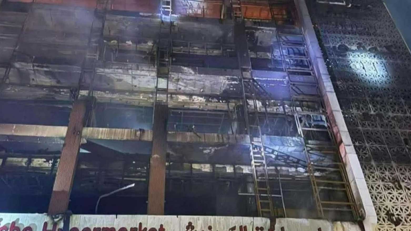 The charred remains of the Hyper Mall building in Kut, Iraq, stand in silence the day after a devastating fire killed 61 people and injured dozens more, July 17, 2025. (Photo: Social Media)