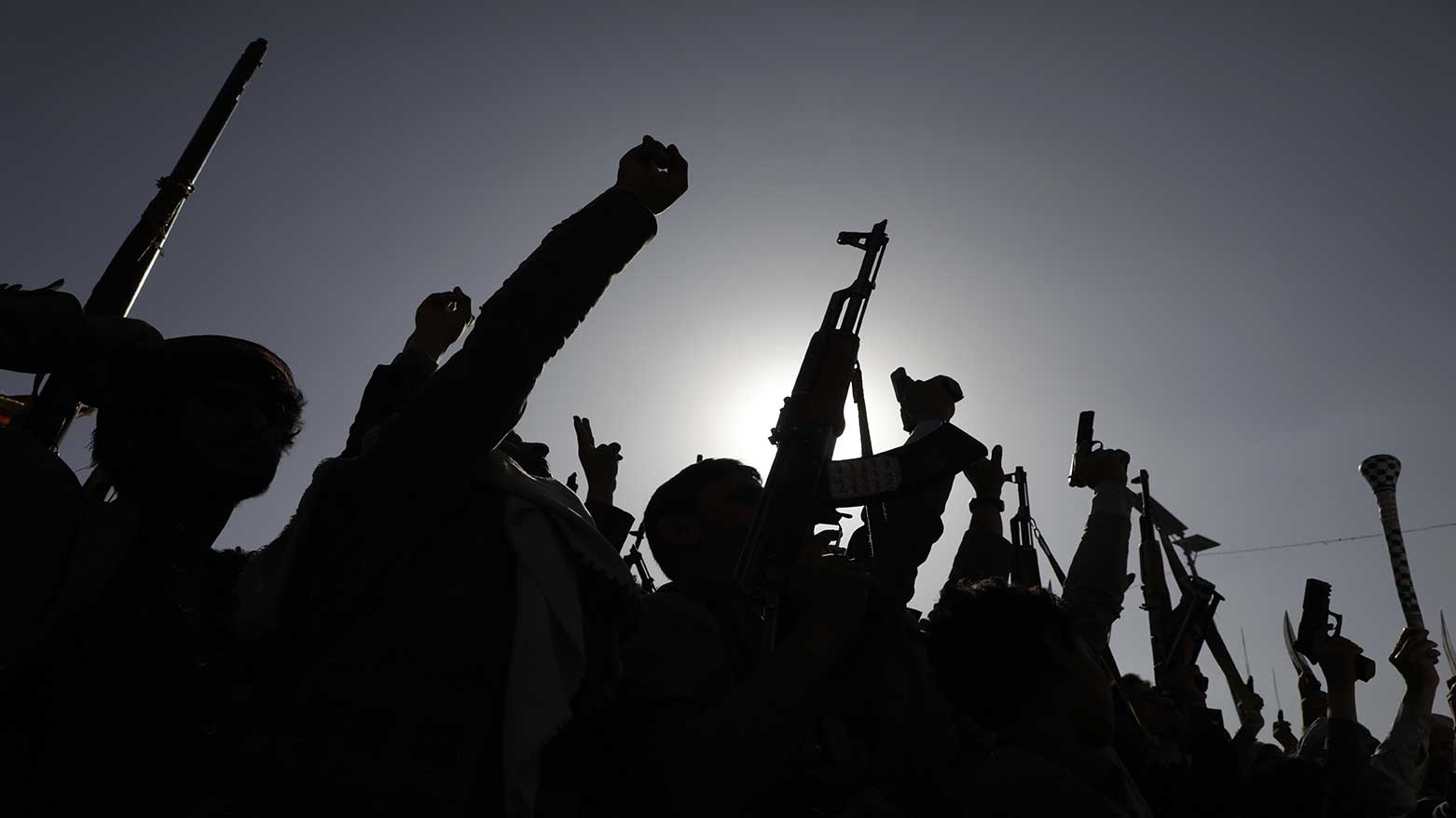 Houthi supporters and members raise weapons as they shout slogans during an anti- U.S and Israel rally in Sanaa, Yemen, Feb. 14, 2025. (Photo: AP)