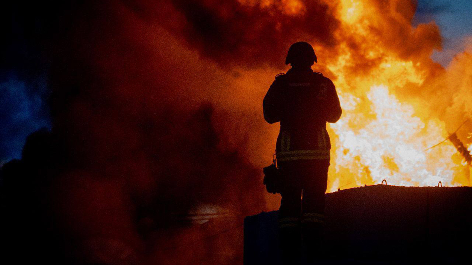 The photo shows Ukrainian firefighters trying to extinguish fire caused by drone strikes. (Photo: Ukrainian President's Telegram)