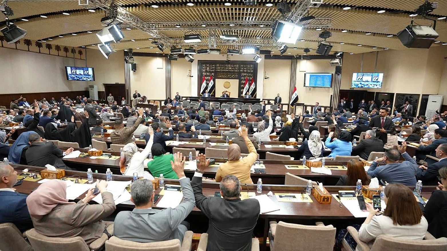 This photo from Iraqi parliament shows the Iraqi lawmakers attend a parliamentary session. (Photo: AP)