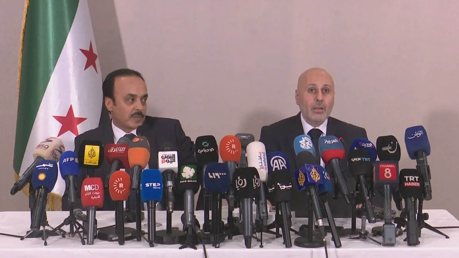 Yasser Farhan, spokesperson for the Committee for Investigation and Fact-Finding in the Syrian coastal region (right), speaking at the presser, July 22, 2025. (Photo: Kurdistan24)