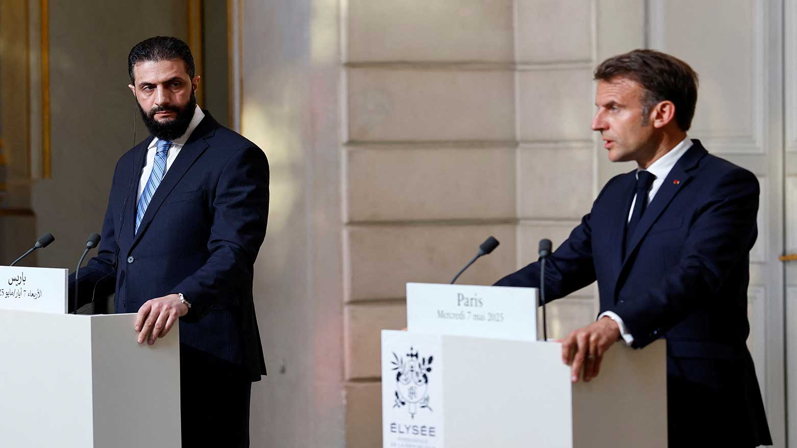 Syria's interim President Ahmad al-Sharaa, left, listens during a joint press conference with French President Emmanuel Macron at the Elysee Palace in Paris, May 7, 2025. (Photo: AP)