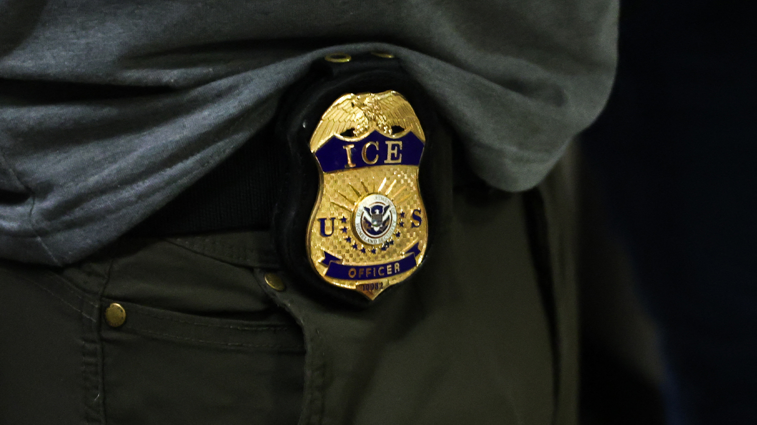 The badge of an Immigration and Customs Enforcement (ICE) officer stands. (AFP)