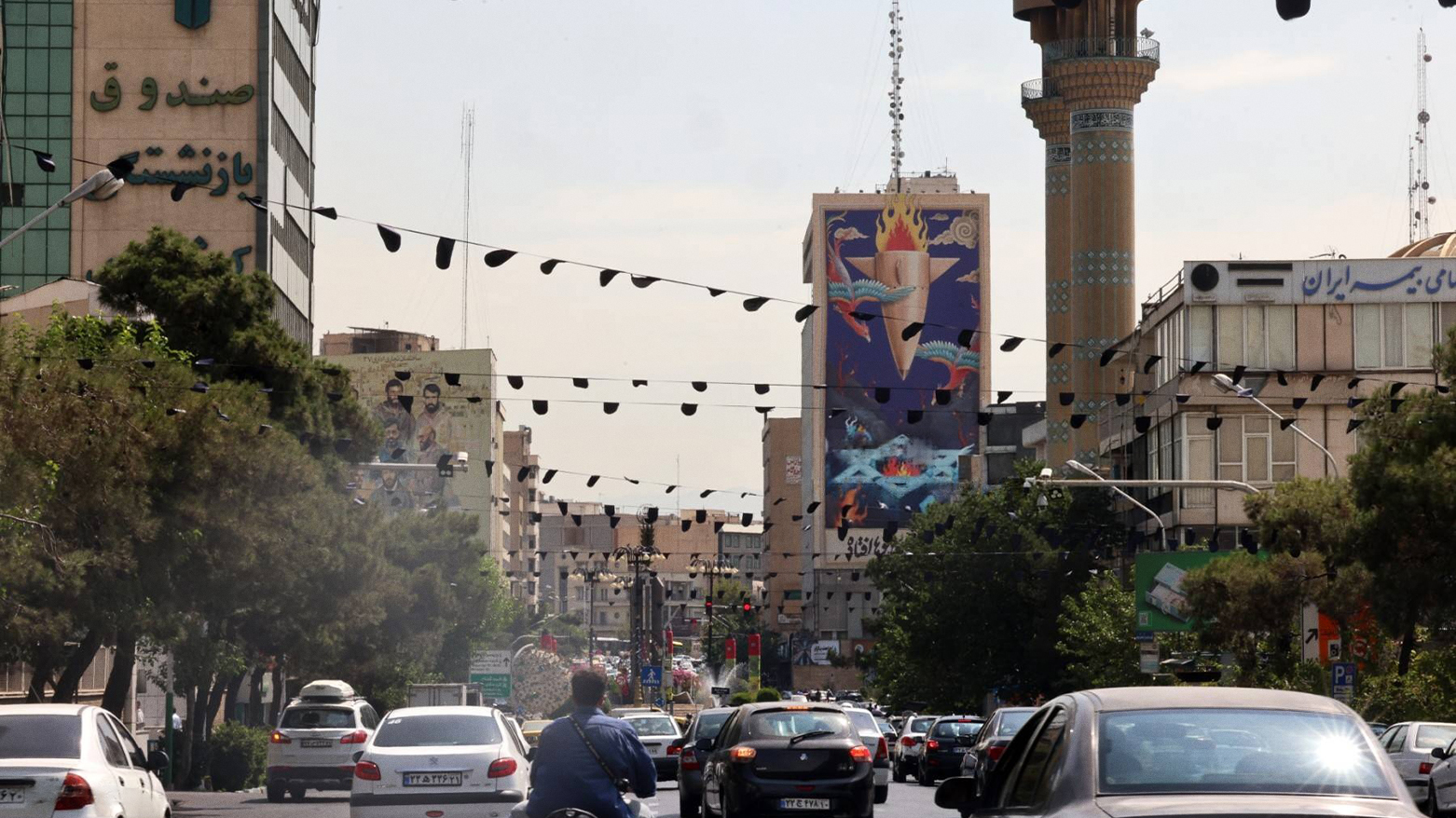 Billboard in Tehran depicts missile strike on Israel, July 16, 2025, after Iran-Israel conflict. (AFP)