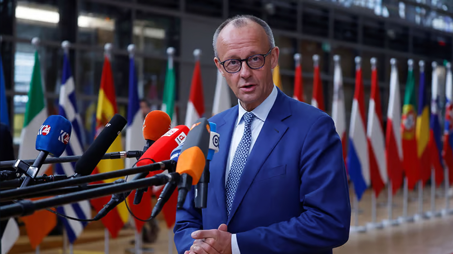Germany's Chancellor Friedrich Merz speaks with the media as he arrives for an EU summit at the European Council building in Brussels, Thursday, Jun. 26, 2025. (Photo: AP)