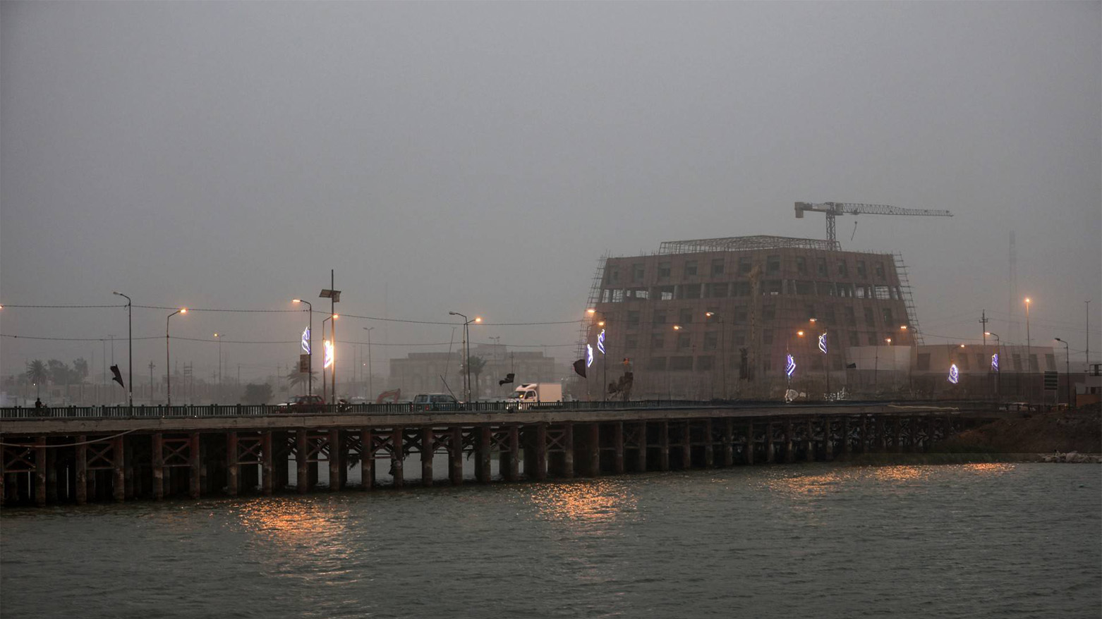 The Euphrates River and a government building under construction in Iraq's Nasiriyah, Sept. 23, 2022. (AFP)