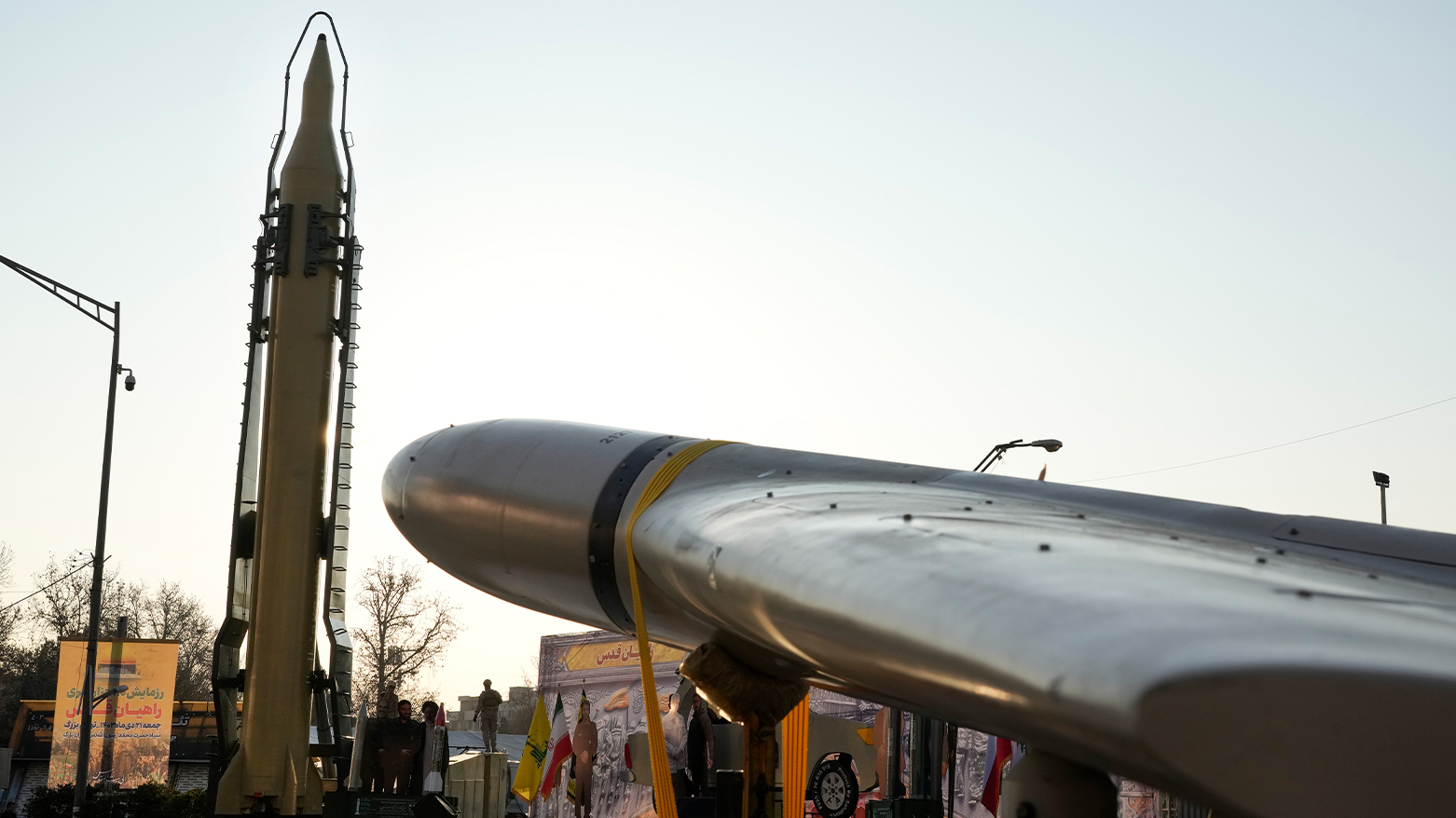 Iranian built missile and drone are displayed during the Basij paramilitary force parade in Tehran. (AP)