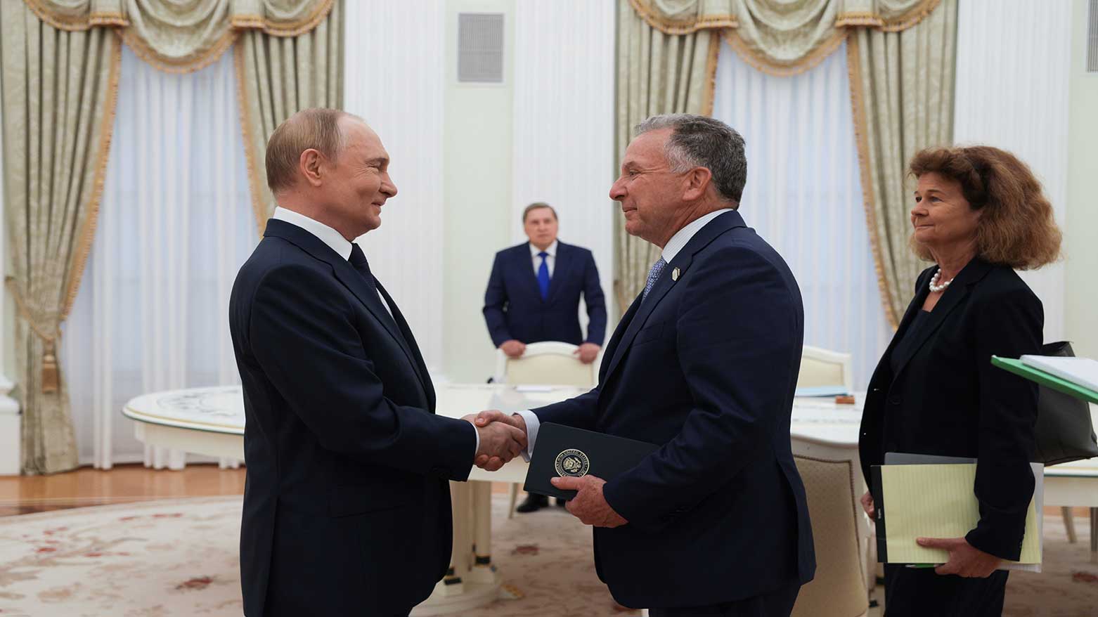 Russian President Vladimir Putin, left, and U.S. President Donald Trump's special envoy Steve Witkoff, right, shake hands during their meeting at the Kremlin in Moscow, Russia, Aug. 6, 2025. (Photo: AP)