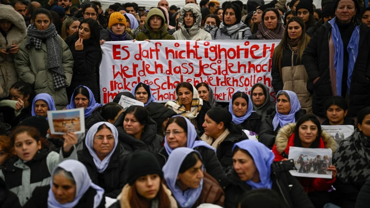 Members of the Yazidi community stage a hunger strike to protest against their deportation to Iraq, in front of the German parliament in Berlin, Oct. 19, 2023. (AFP)