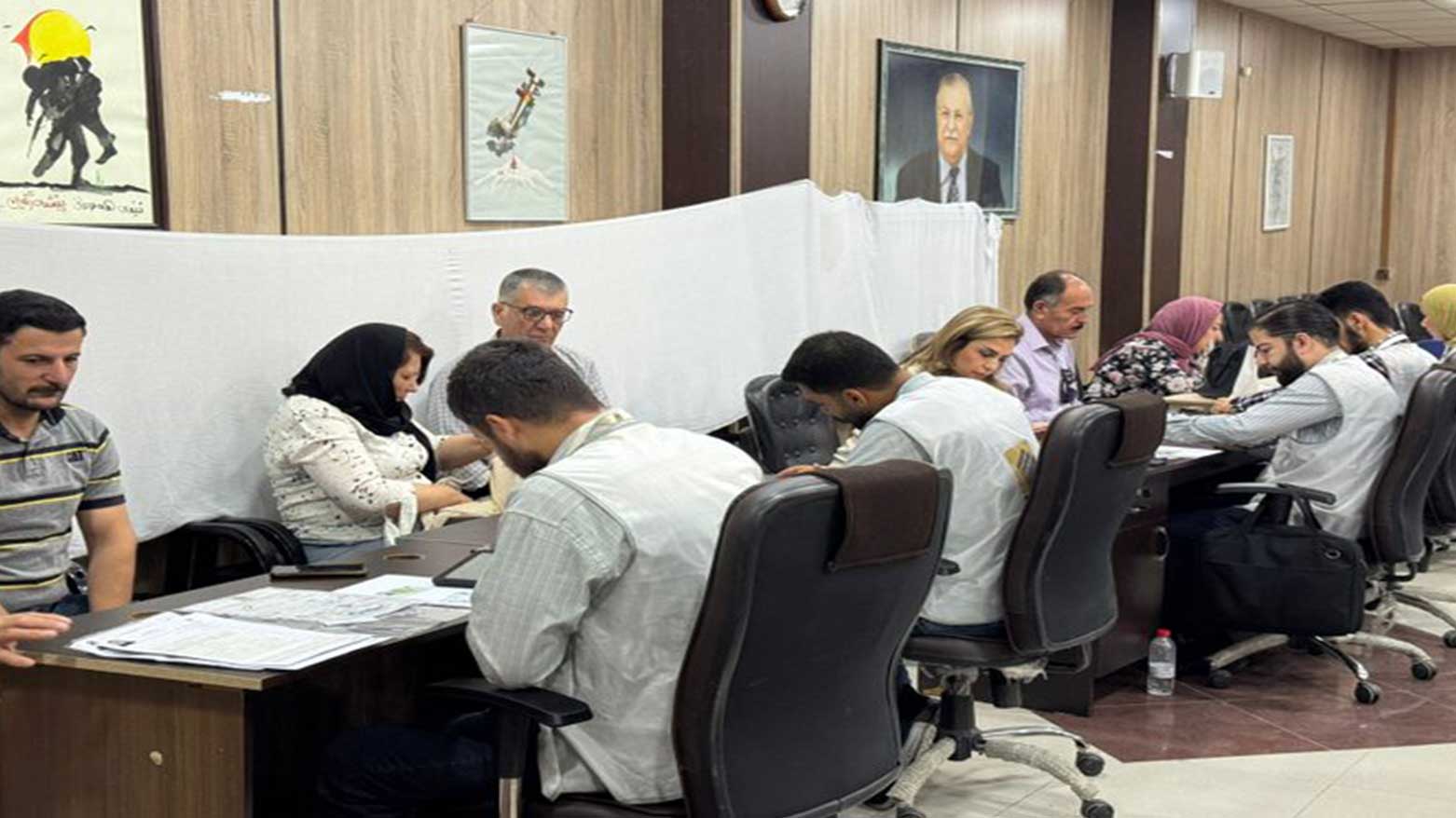 Government employees in Slemani working on the registering process for the KRG MyAccount program as part of the region’s digital payment initiative. (Photo: Azizi Ahmad’s X account)