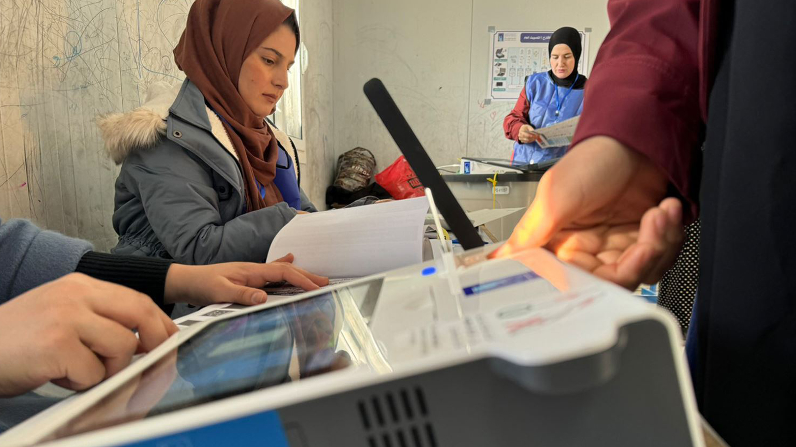هاووڵاتییەک لە کاتی دەنگدان (ئەرشیف)