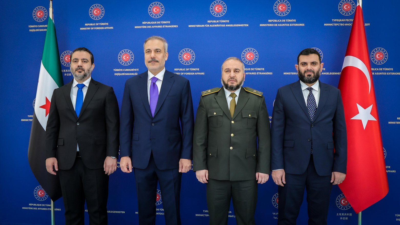 Turkish FM Hakan Fidan with senior Syrian officials in Ankara, Aug. 13, 2025. (AFP)