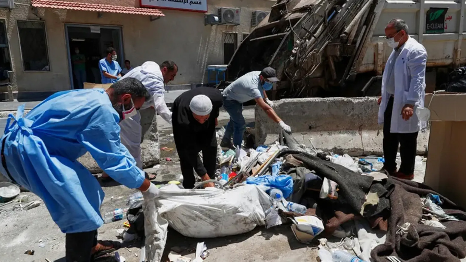 Workers clean the National Hospital following last week's sectarian clashes in the Druze-majority town of Sweida, Syria, on Friday, Jul.25, 2025. (Photo: AP)