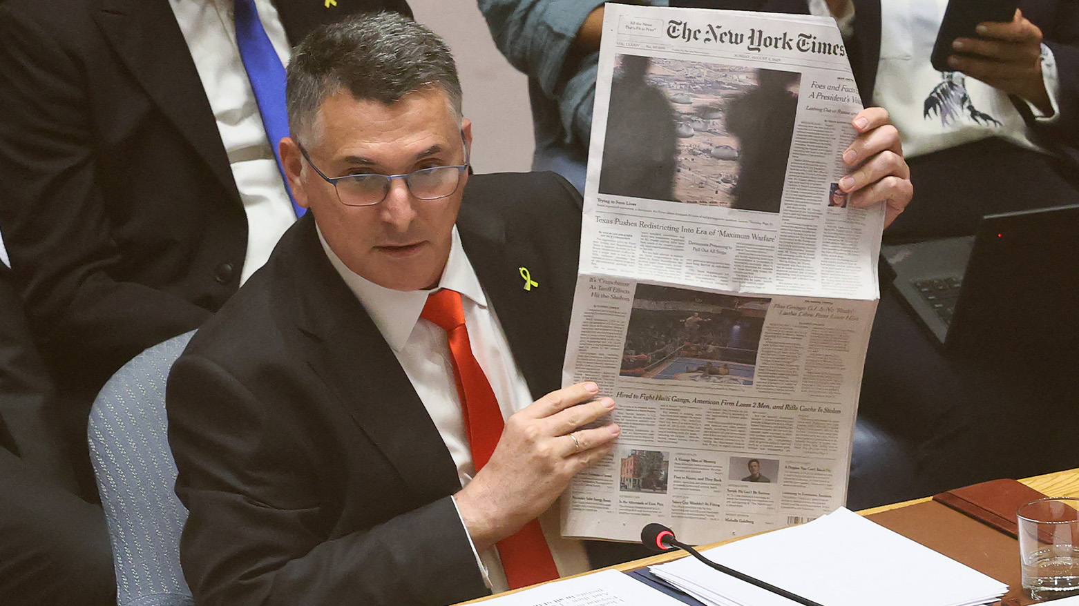Gideon Sa'ar, the Israeli FM, holds up a copy of The New York Times as he speaks during a United Nations Security Council meeting, at the UN headquarters in New York City, on August 05, 2025. (Photo: AFP)