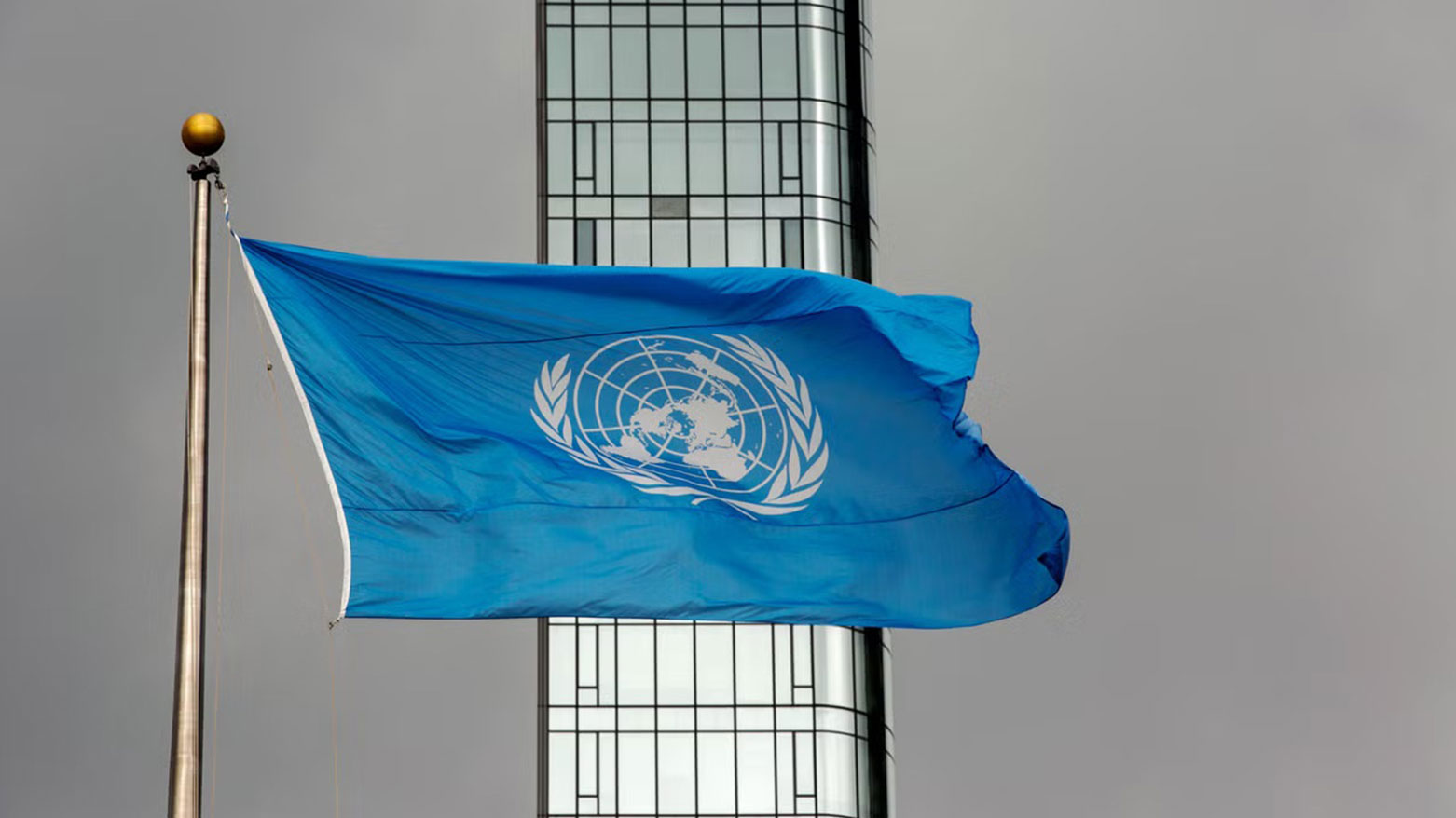 The UN flag flies on a stormy day at the United Nations during the United Nations General Assembly on Sept. 22, 2022. (Photo: AP)