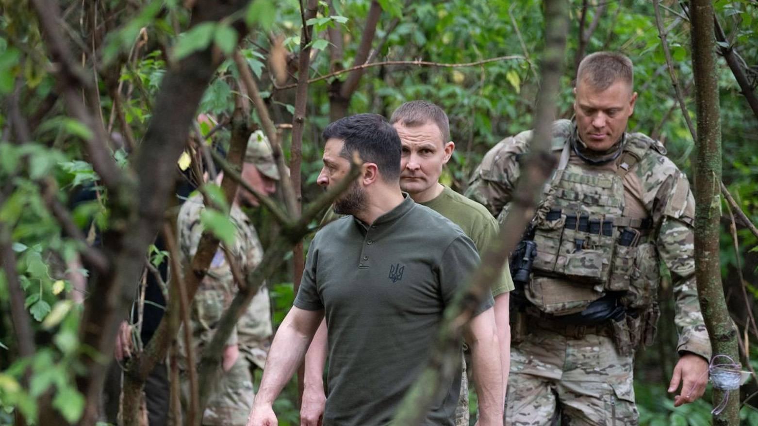 Ukraine's President Volodymyr Zelensky (C) visiting the frontline positions at an undisclosed location in the Kharkiv region, on August 4, 2025. (AFP)