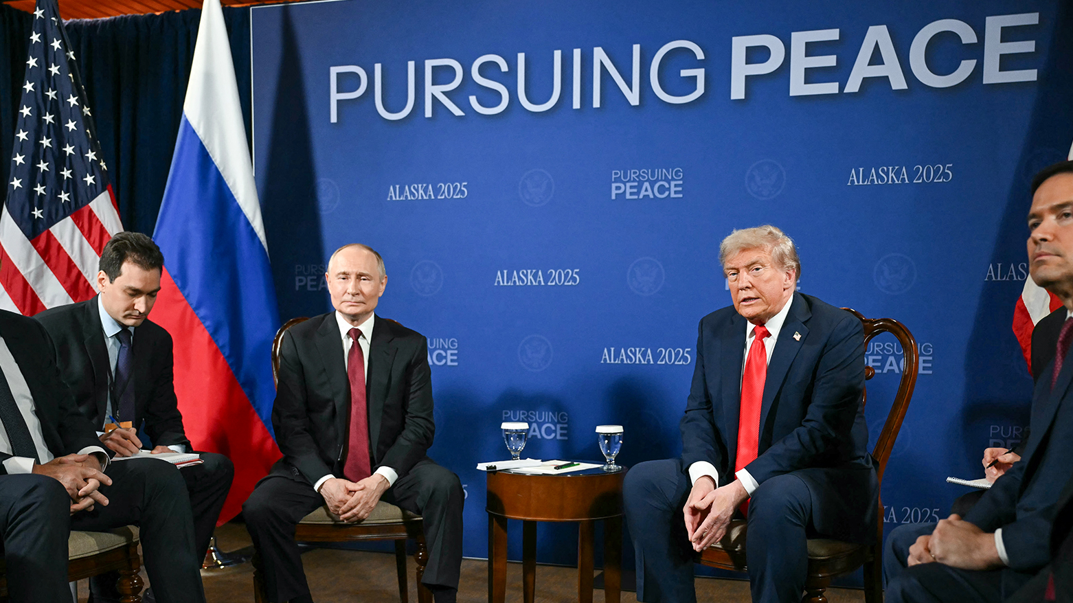 US President Donald Trump (C-R) and Russian President Vladimir Putin (C-L), flanked by US Secretary of State Marco Rubio (R), meet during a US-Russia summit on Ukraine in Alaska, on Aug. 15, 2025. (AFP)
