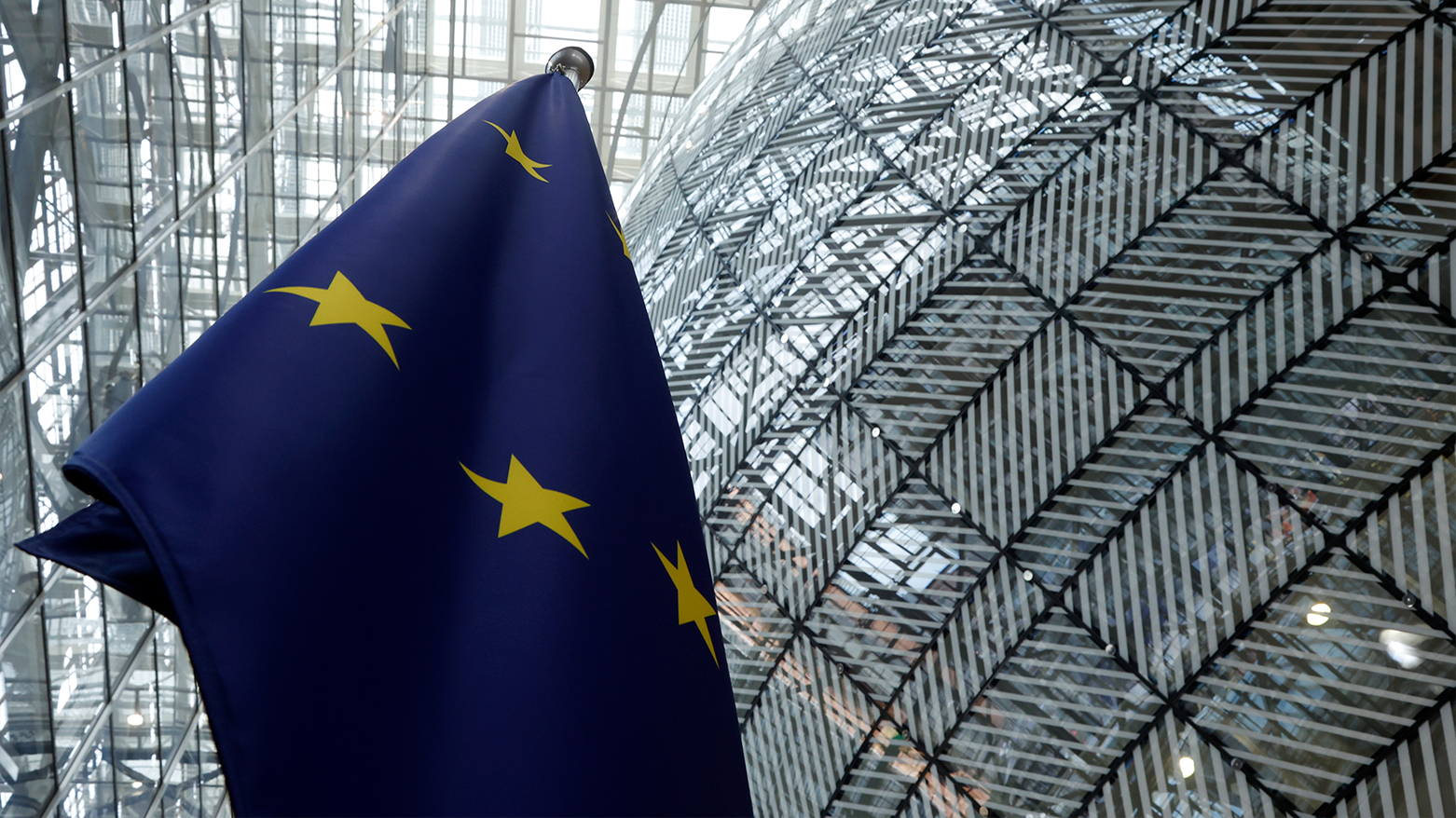The European Union flag stands inside the atrium at the European Council building in Brussels, June 17, 2024. (Photo: AP)