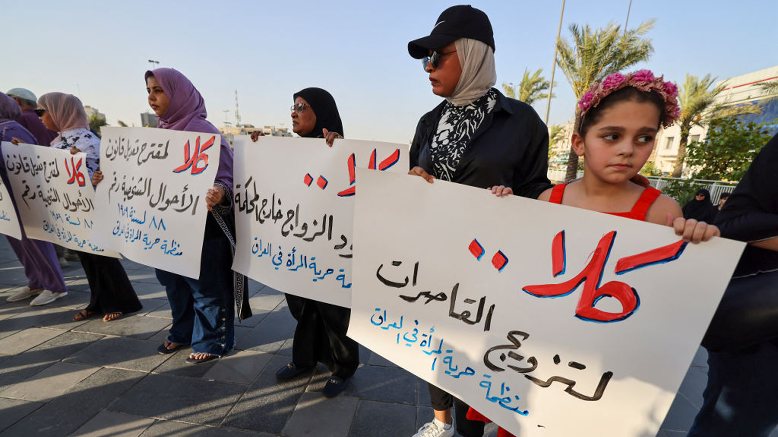 Activists demonstrate against female child marriages in Tahrir Square in central Baghdad on July 28, 2024. (Photo: AFP)