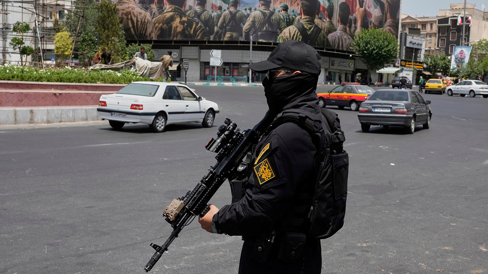 A member of Iran's IRGC stands guard at Enqelab-e-Eslami square in downtown Tehran, Iran, June 24, 2025. (AP)