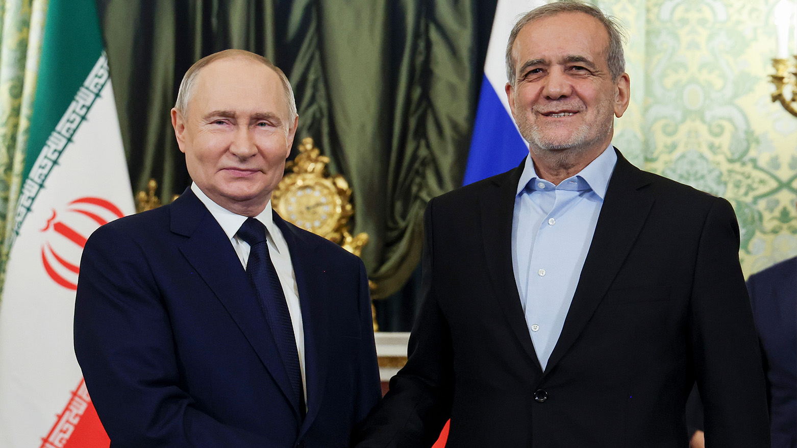 Russian President Vladimir Putin, left, and Iranian President Masoud Pezeshkian pose for a photo during their meeting at the Kremlin in Moscow, Russia, on Jan. 17, 2025. (AP)