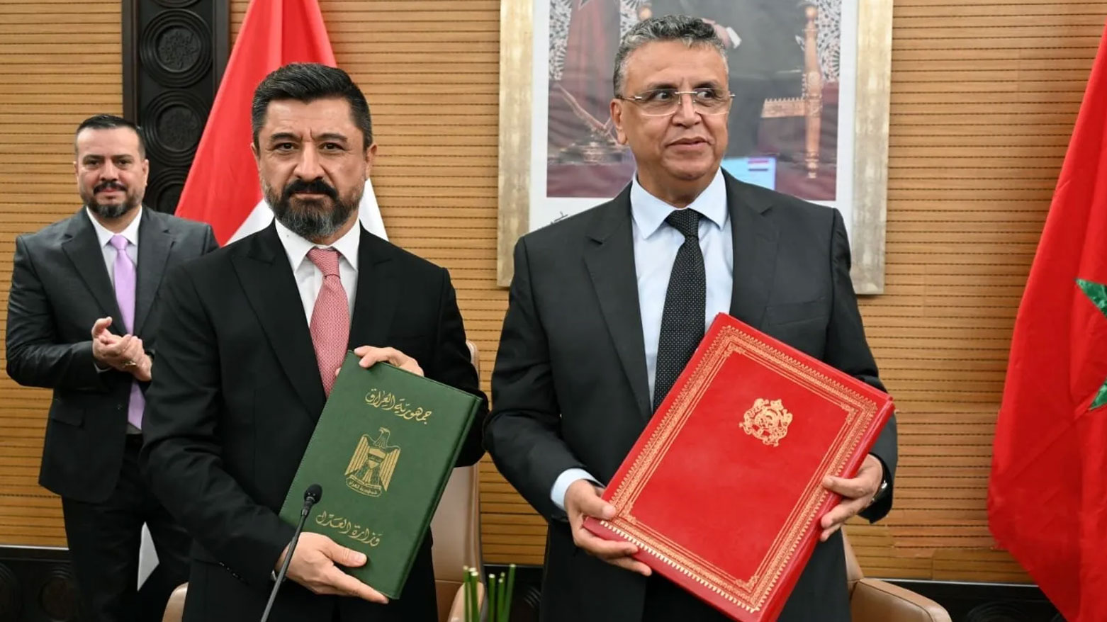 وزيرا العدل، المغربي عبد اللطيف وهبي  والعراقي خالد شواني (وكالة الأنباء العراقية)