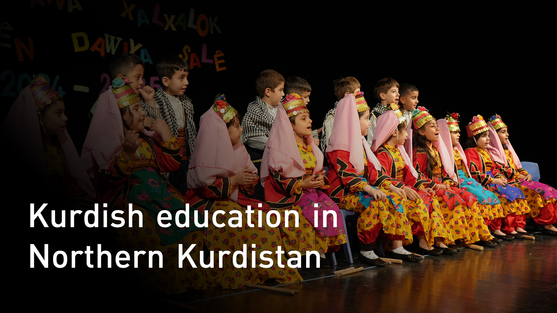 Kurdish children in traditional Kurdish clothing. (Graphic: Kurdistan24)