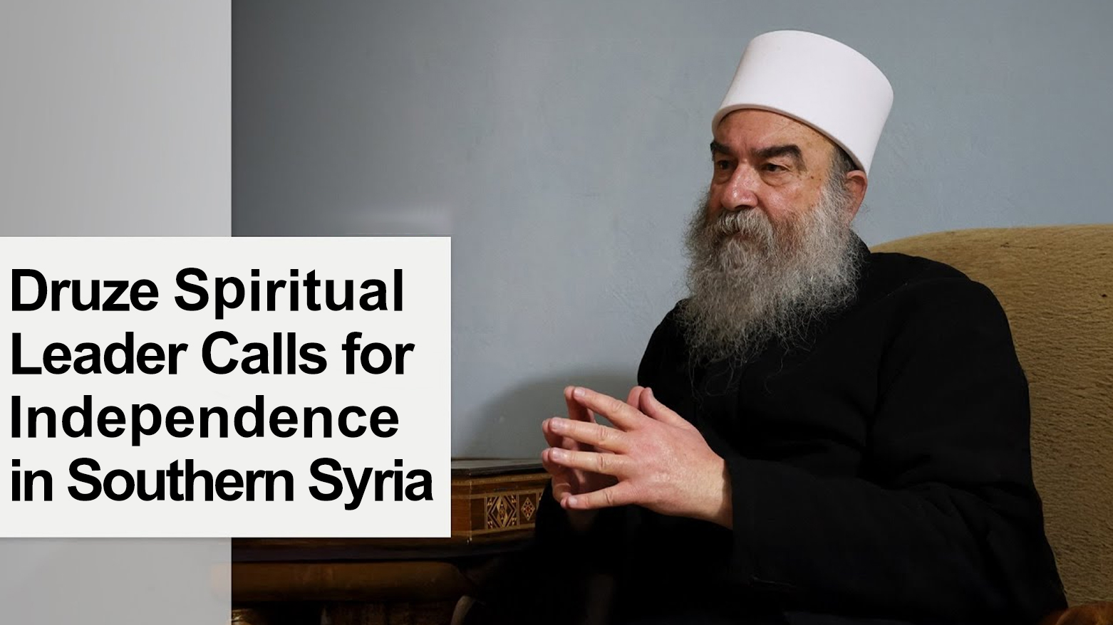 The spiritual leader of Syria’s Druze community, Sheikh Hikmat al-Hijri. (Graphic: Designed by Kurdistan24)