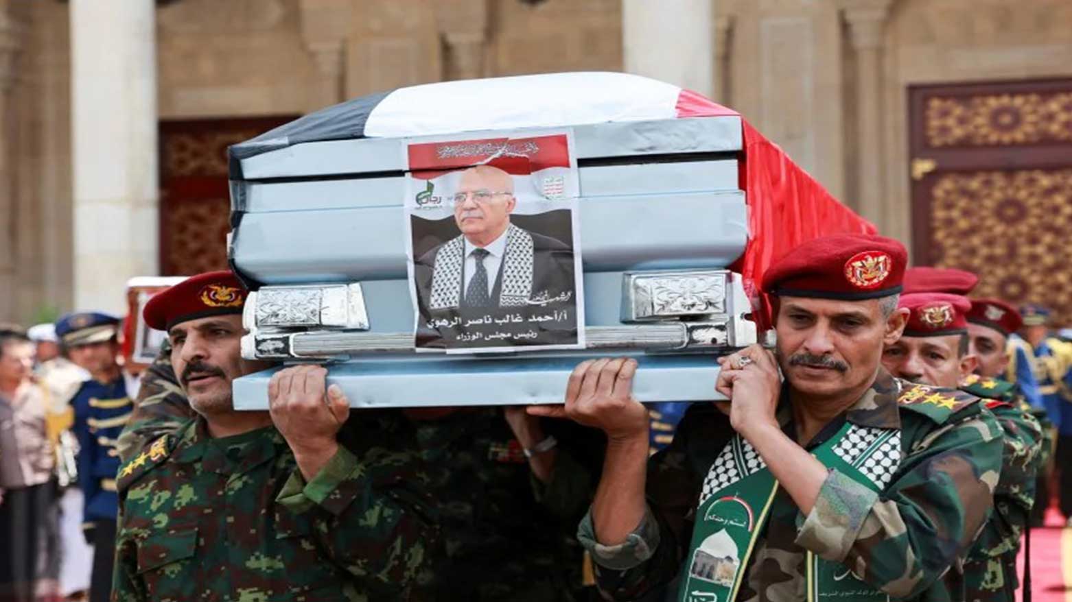 Military officers carry the coffin of Yemen’s Houthi-led government Prime Minister Ahmed Ghaleb Al-Rahwi during the funeral procession for Houthi officials killed in an Israeli strike, Yemen. (Photo: Houthi Gov.)