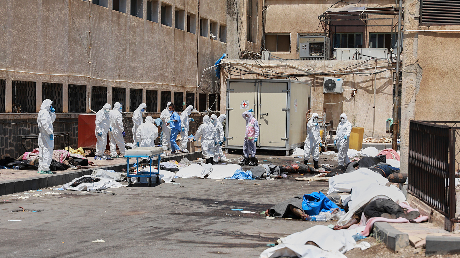 Morgue workers bag bodies after clan clashes in Sweida, Syria, July 21, 2025. (Photo: AP)