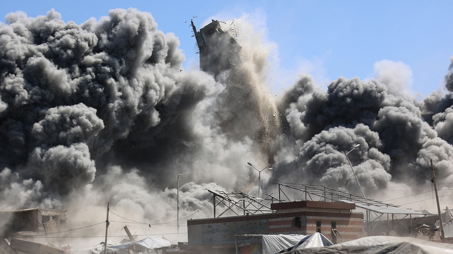 Smoke billows in Gaza City after Israeli strikes on Tiba tower on Sep. 10, 2025. (AFP)