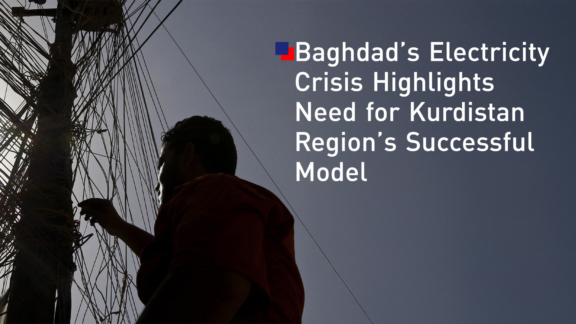 A man working on a utility pole tangled with numerous wires in Baghdad. (Photo: Designed by Kurdistan24)