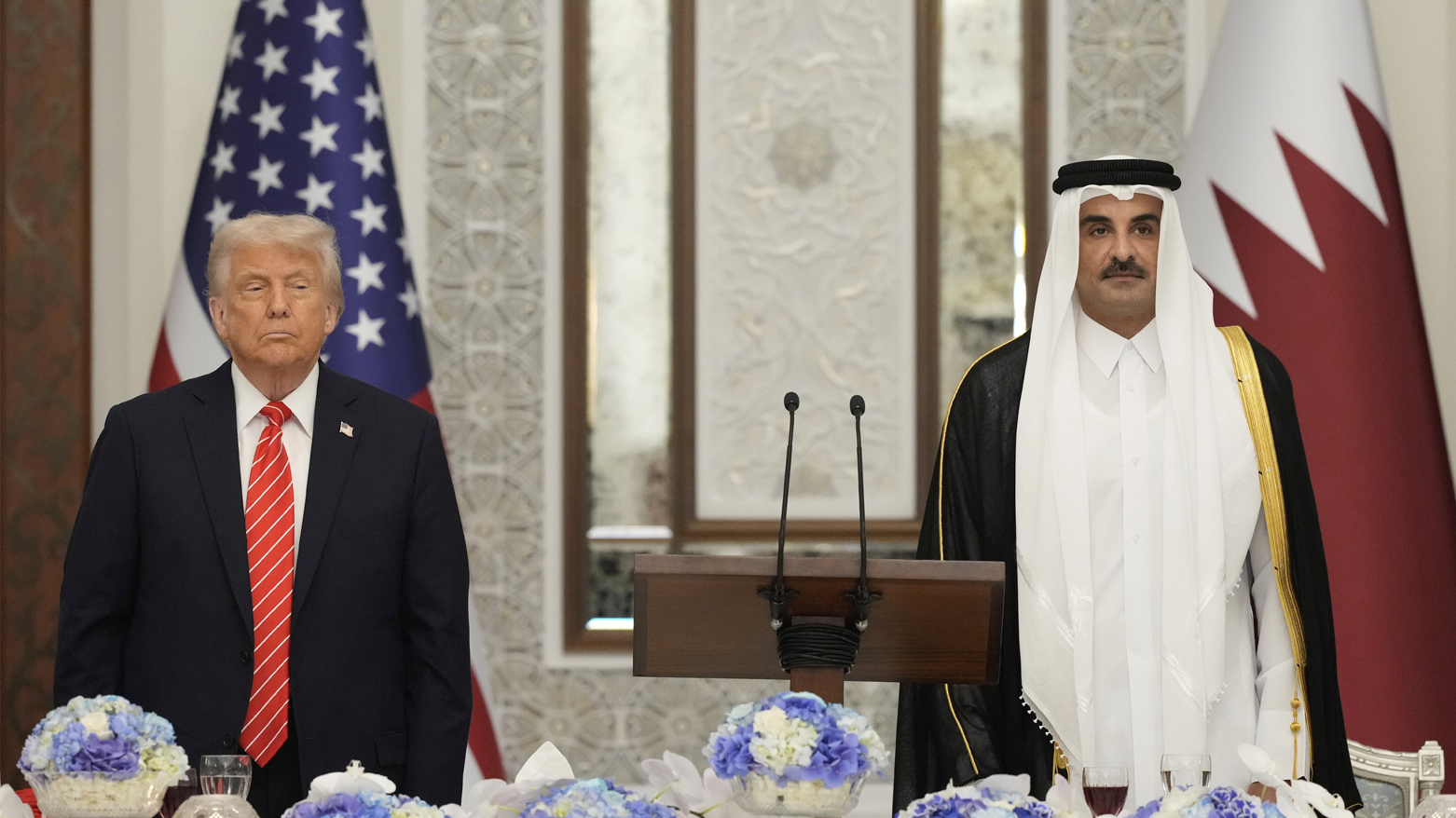 Qatar's Emir Sheikh Tamim bin Hamad al-Thani (R) and US President Donald Trump (L), in Doha on May 14, 2025. (AFP)