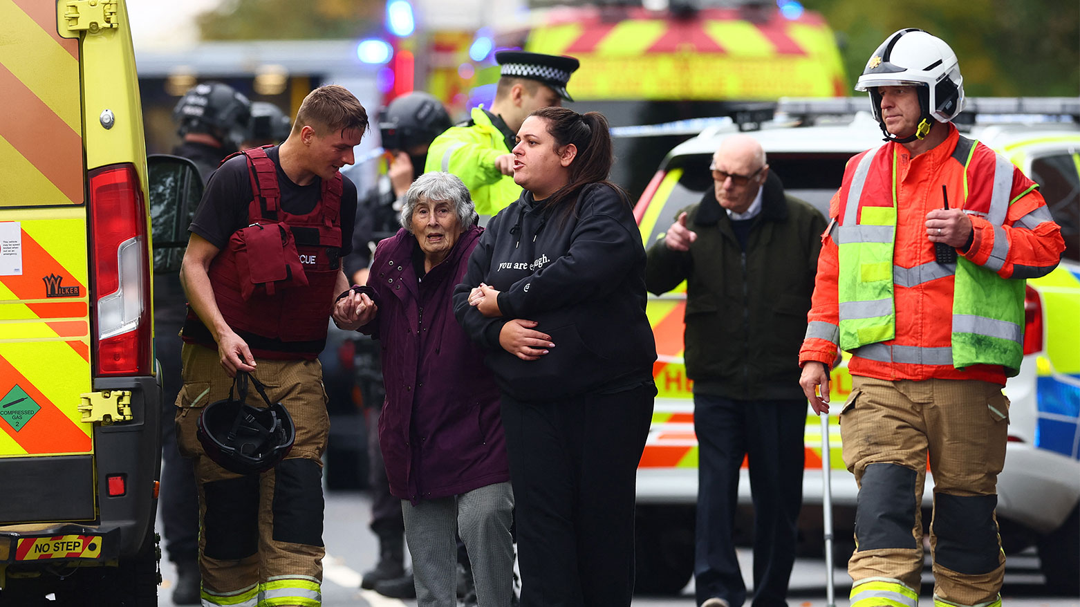 Members of the emergency services evacuate members of the community near Heaton Park Hebrew Congregation synagogue in Crumpsall, north Manchester, on October 2, 2025. (Photo: AFP)